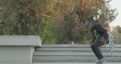 Man Performs Trick on Skateboard Stock Footage 37709216