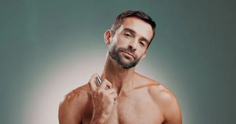 Man, perfume and face spray on neck for beauty, wellness or luxury fragrance for Stock-Footage 303714764