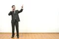 The man phone and gesture on the white wall background Photo
