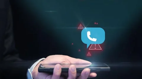 Man on Phone Call Falls Victim to Vishing Scam. Graphic Fraud Alert Overlay Stock Footage 339037009