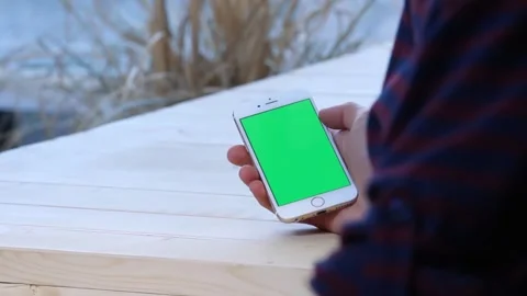 Man on phone with green screen Stock Footage 246057261