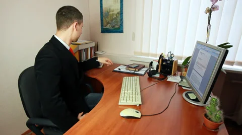 Man On Phone Taking Notes At Work Stock Footage 39149909