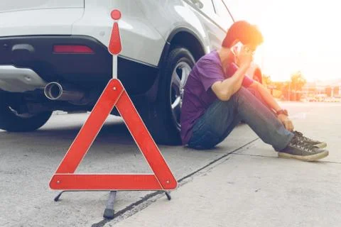 Man Phoning For Help with a broken down car Stock Photos