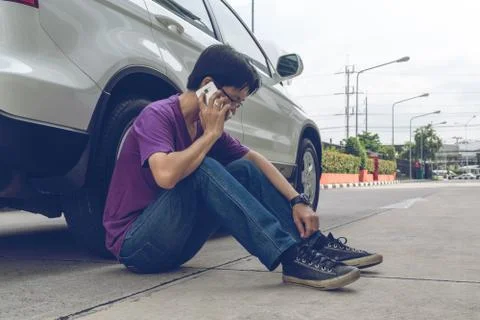 Man Phoning For Help with a broken down car Stock Photos