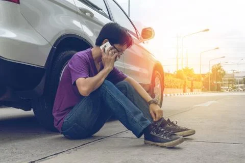 Man Phoning For Help with a broken down car Stock Photos