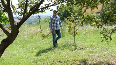 Man with pickaxe Stock Footage 183920785