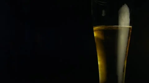 Man Picking up Beer Glass Stock-Footage 12317494