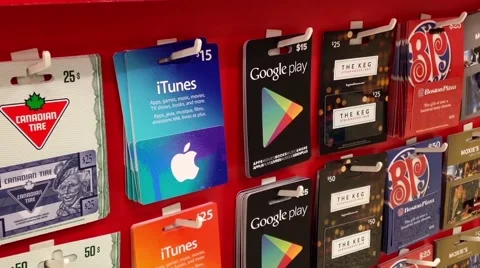 Man picking the google play gift card Stock Footage 51637628