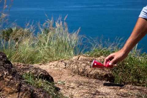 Man picking up litters Stock Photos