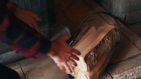 Man Picking Up Logs Stock Footage 83598619