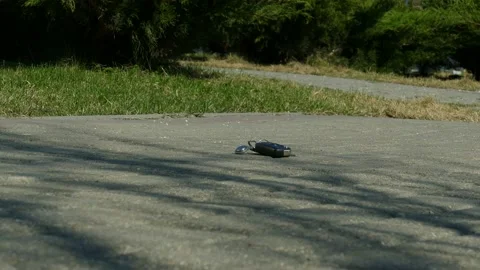 Man picking up lost keys from the path Stock Footage 152092361
