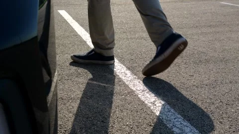 Man Picking Up Lost USB Flash Drive in Park Area Stock Footage 336151676