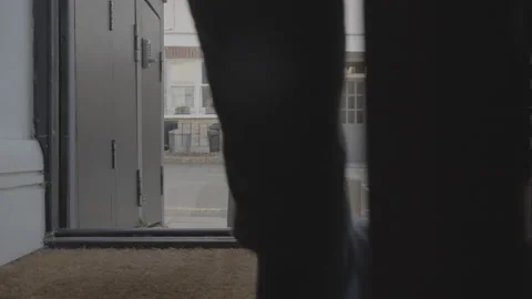 Man picking up Parcel Delivery at front door Stock Footage 149753621