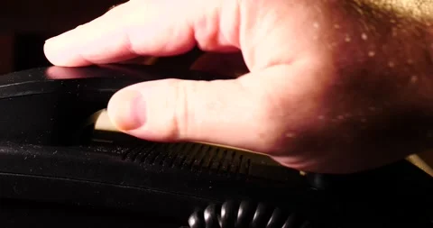 Man picking up phone for an important telephone call Dolly shot Stock Footage 213389708