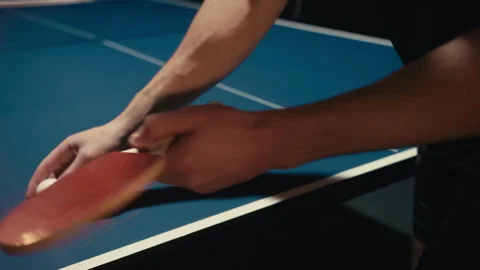 Man picking up the racket from the table Stock Footage 279236009