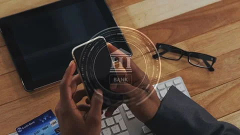 Man picking up smartphone activating banking HUD intensifying, recentering over Stock Footage 333494759