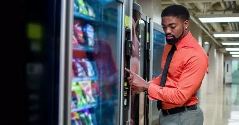 Man picking vending machine snack 4k Video stock 41777089