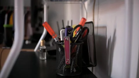 A man picks up a comb and then puts it again Stock Footage 285582229