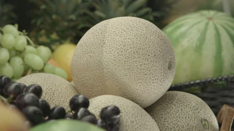 Man Picks Up Mango Stock Footage 27296636