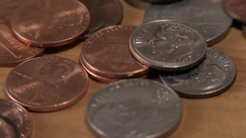 Man Picks Up A U.S. Dime - Macro, Tilt Down Vídeo Stock 148698788