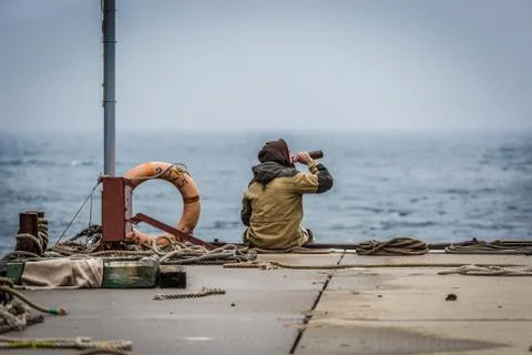 Man on the pier Stock Photos