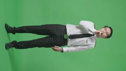 Man Pilot Looking At Camera And Making Shh Gesture In The Green Screen Stock Footage 244399973