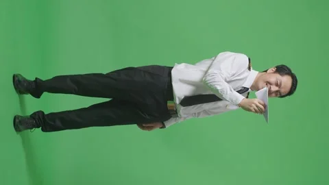 Man Pilot In Paper Plane, Jet Model In Hands, Aircraft Captain On Green Screen Stock Footage 244401372