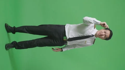 Man Pilot Shouting To Camera While Standing In The Green Screen Background Stock Footage 244399506