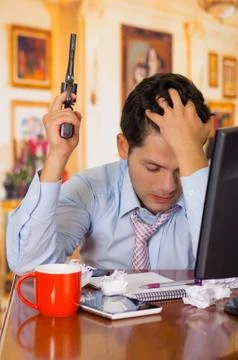 Man with pistol gun wants to commit suicide, inside a house room, room 스톡 사진