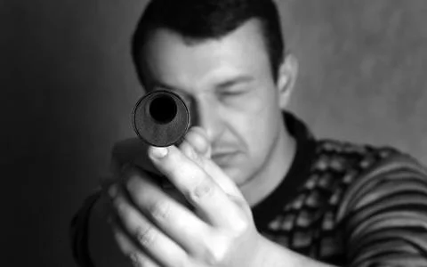 Man with a pistol Stock Photos