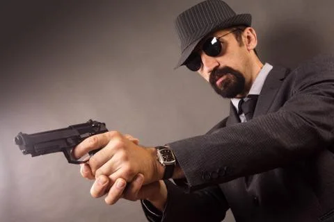 Man with pistol Stock Photos