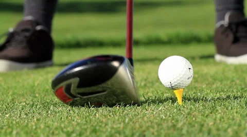 MAN PLACES GOLF BALL ON TEE AND HITS IT | CLOSE UP 스톡 동영상 34708771