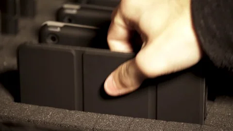 Man placing and removing iPad from transport case Video stock 104082410