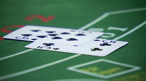 Man placing card on poker table Stock Footage 61085166