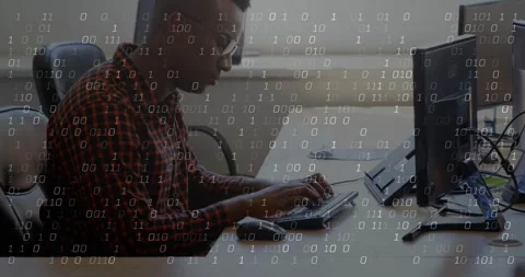 Man placing hands on keyboard, coding and leaning forward at tech desk, binary Stock Footage 330380082
