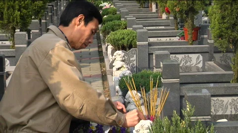 Man placing incense Stock Footage 343282