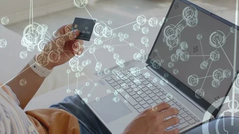 Man placing laptop, lifting card and turning chip while typing, overlay linking Stock Footage 333463774