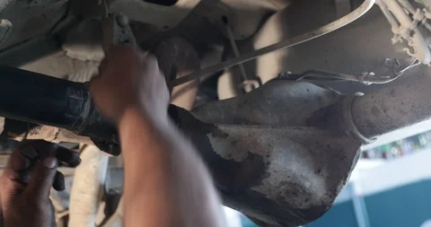 Man placing snap ring to fix universal cross joint to cardan joint 스톡 동영상 103374269