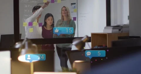 Man placing sticky notes team using tablet animated likes rising around glass Stock Footage 329932121