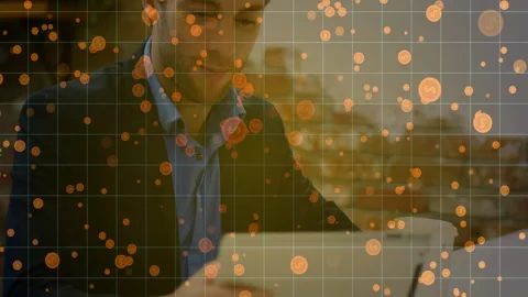 Man placing tablet on desk and tapping screen for business analysis with Stock Footage 313307784