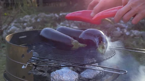 Man placing Vegetables Red Pepper on Grill Stock Footage 150131805