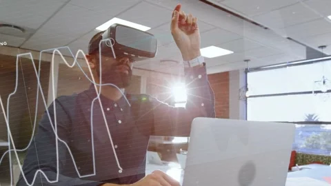 Man placing VR headset alternating keyboard and HUD taps, refining tech graphs Stock Footage 332686214