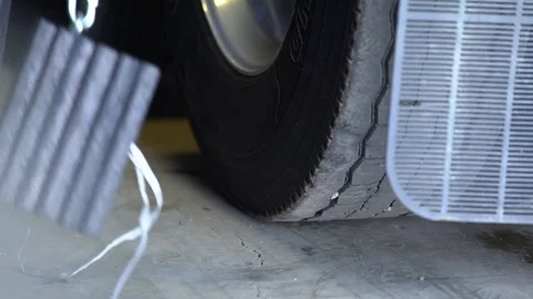 Man is placing wheel stoppers under the truck. Stock-Footage 82709072