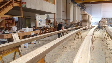 Man planning a piece of timber in a timber factory, static shot Video stock 93952786