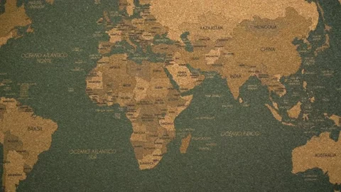 Man planning vacation using a cork board world map Stock Footage 135716947