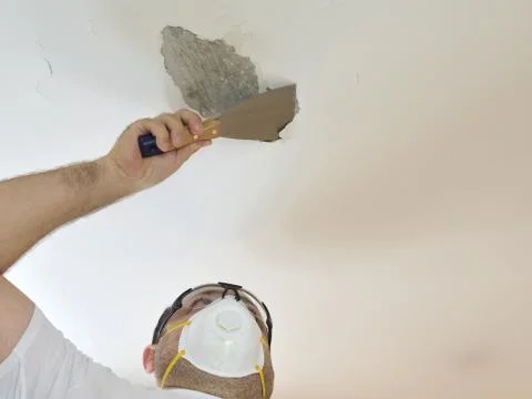 Man with Plaster Spatula Stock Photos