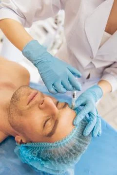 Man at the plastic surgeon Foto stock