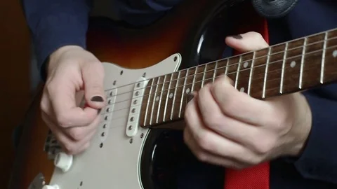 Man play guitar solo Stock Footage 76839628