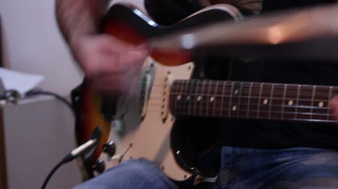 Man play guitars Stock Footage 45993622