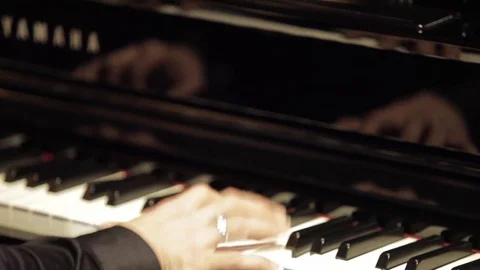 Man play piano Stock Footage 82670281